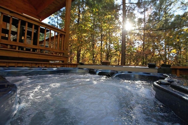 view of pool featuring a hot tub