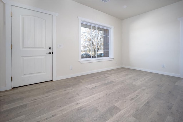 foyer entrance featuring light wood-type flooring