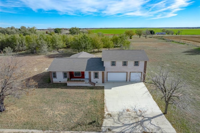 birds eye view of property with a rural view