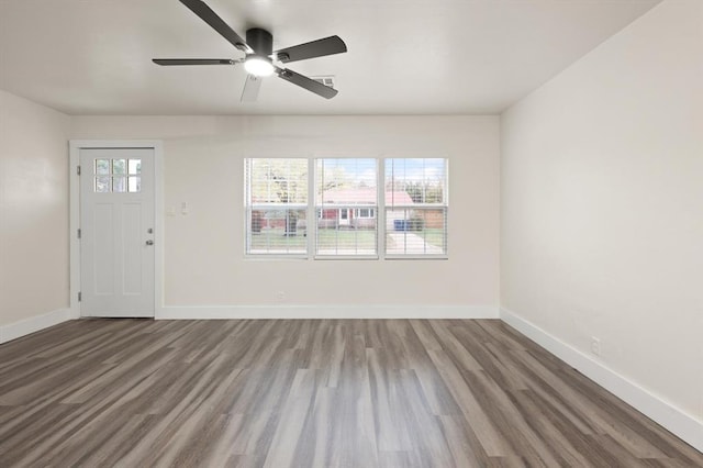 foyer entrance featuring ceiling fan and hardwood / wood-style flooring