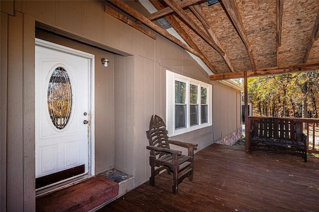 doorway to property with covered porch