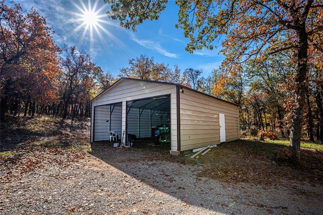 garage featuring a carport