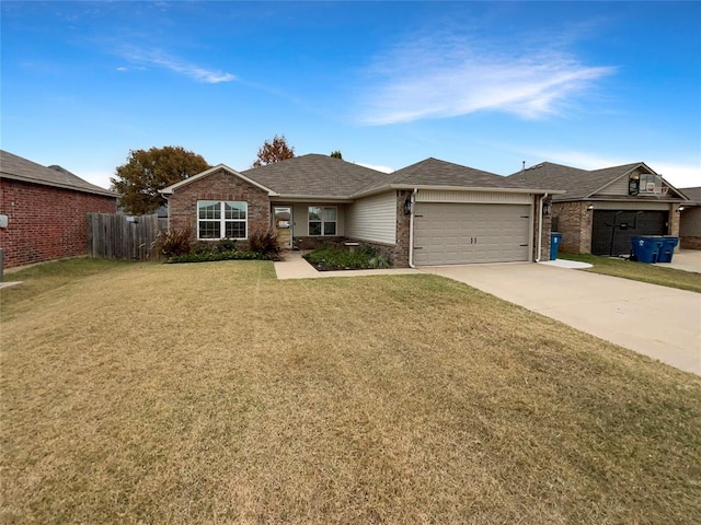 single story home with a garage and a front lawn