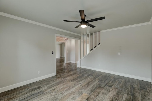 empty room with hardwood / wood-style flooring, ceiling fan, and crown molding