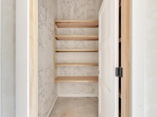 stairs featuring concrete floors