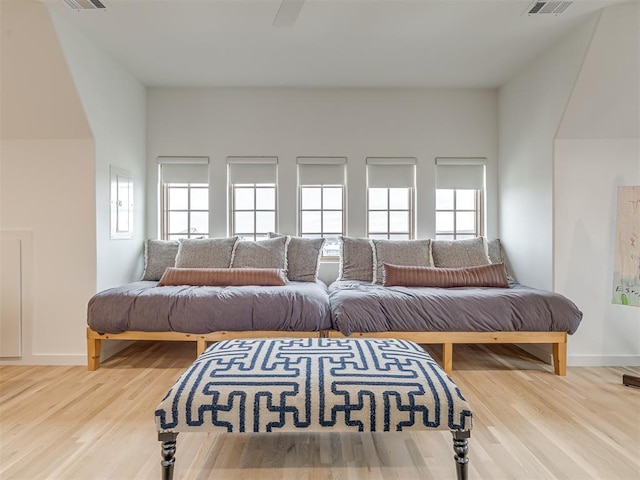 living room with hardwood / wood-style floors and plenty of natural light