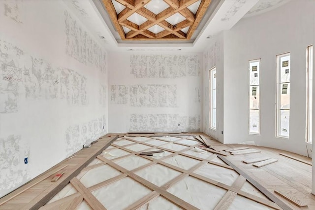 spare room featuring coffered ceiling