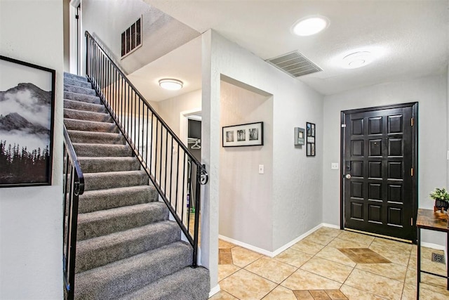 view of tiled entrance foyer