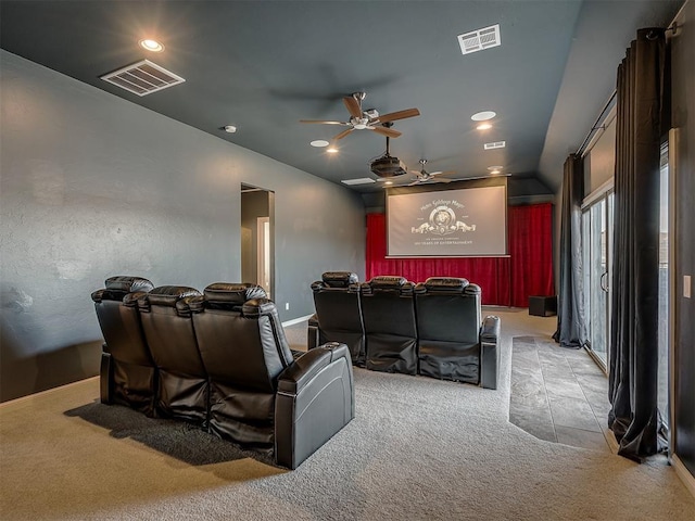 cinema room featuring light colored carpet, ceiling fan, and lofted ceiling