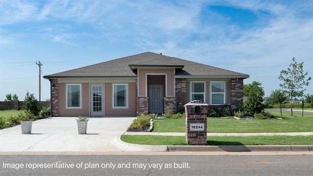 prairie-style house with a front lawn