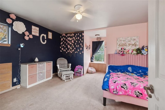 carpeted bedroom with ceiling fan