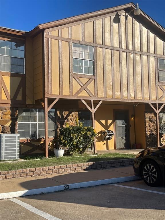 view of front of property featuring central AC unit