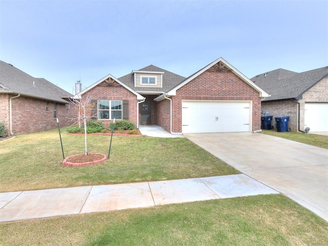 view of front of property with a garage and a front yard