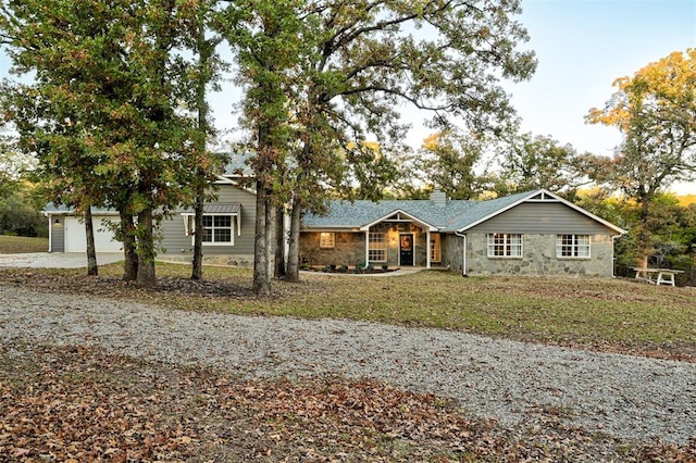 single story home with a garage