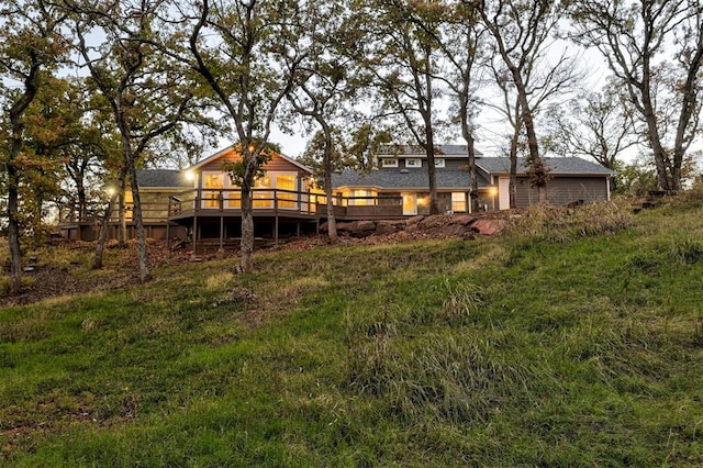 rear view of property with a deck