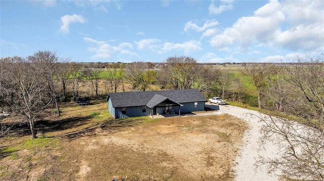 view of front of house featuring a rural view