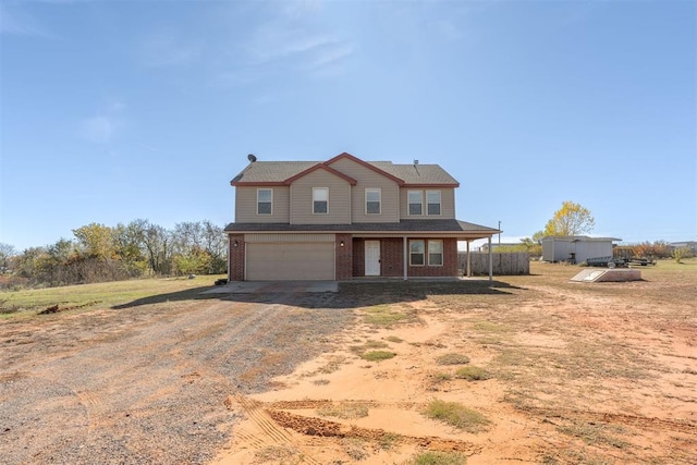 view of front of home with a garage