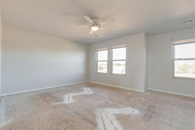 spare room with ceiling fan