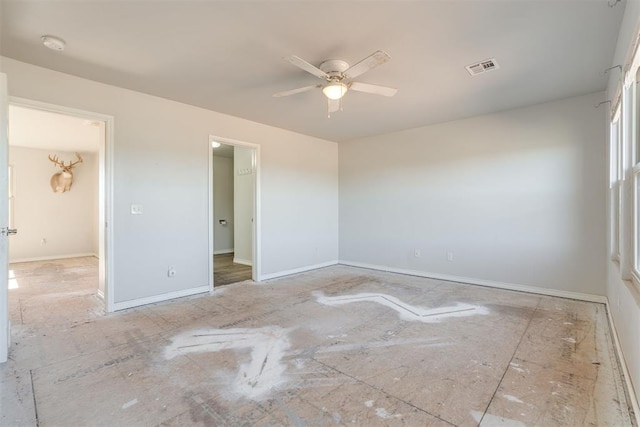 empty room featuring ceiling fan