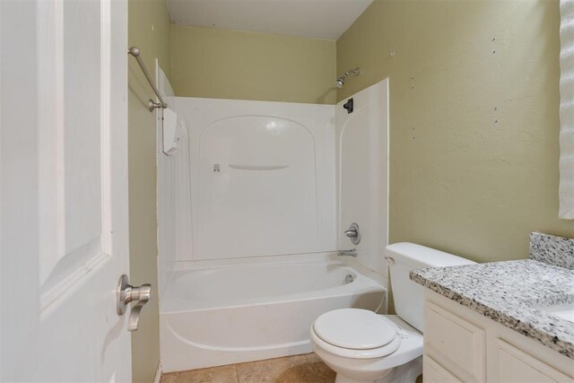 full bathroom featuring tile patterned flooring, vanity, toilet, and shower / bathtub combination