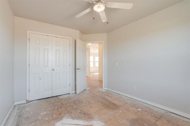 unfurnished bedroom with a closet and ceiling fan