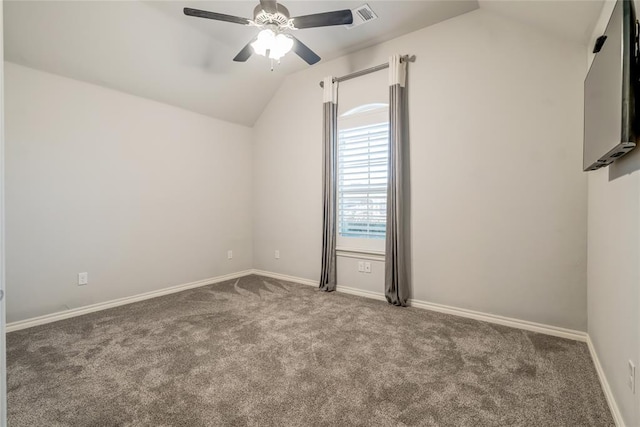 interior space featuring lofted ceiling, carpet floors, and ceiling fan