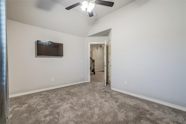 unfurnished room featuring lofted ceiling, carpet floors, and ceiling fan