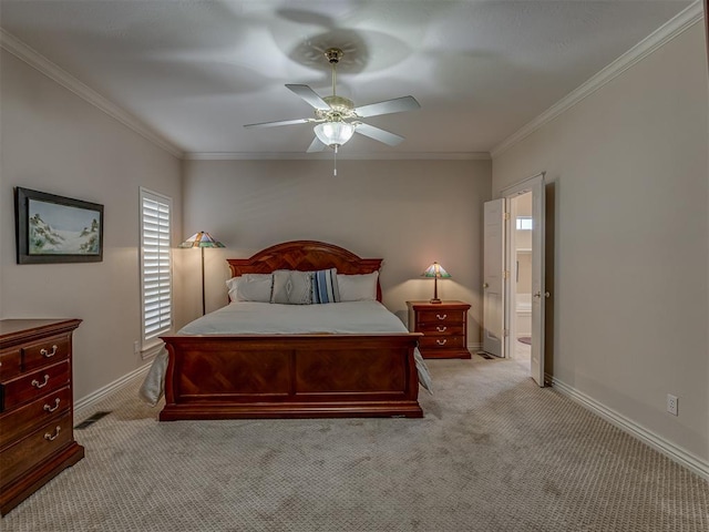 carpeted bedroom with crown molding, ceiling fan, and ensuite bath