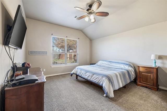 carpeted bedroom featuring ceiling fan and vaulted ceiling