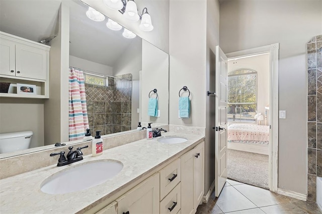 bathroom featuring tile patterned floors, toilet, vaulted ceiling, and a shower with shower curtain