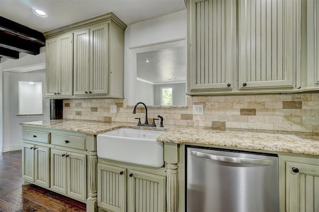 kitchen with light stone countertops, dark hardwood / wood-style flooring, tasteful backsplash, stainless steel dishwasher, and sink