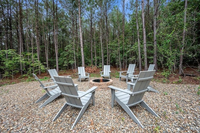 view of patio / terrace with an outdoor fire pit