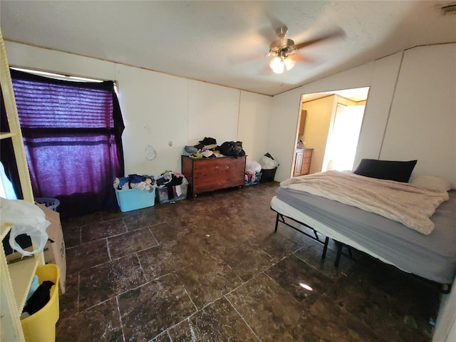 bedroom featuring ceiling fan and lofted ceiling