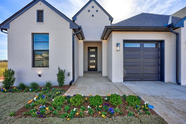 view of front of house with a garage