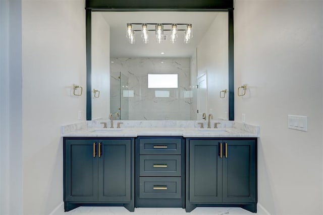 bathroom with vanity and a shower with door