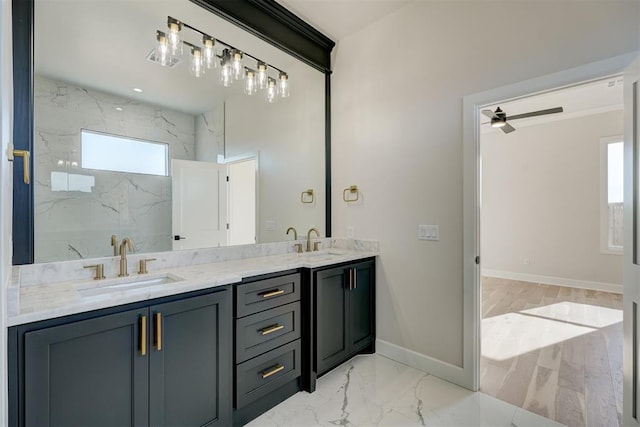 bathroom featuring a tile shower, ceiling fan, hardwood / wood-style floors, and vanity