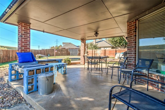 view of patio / terrace featuring ceiling fan