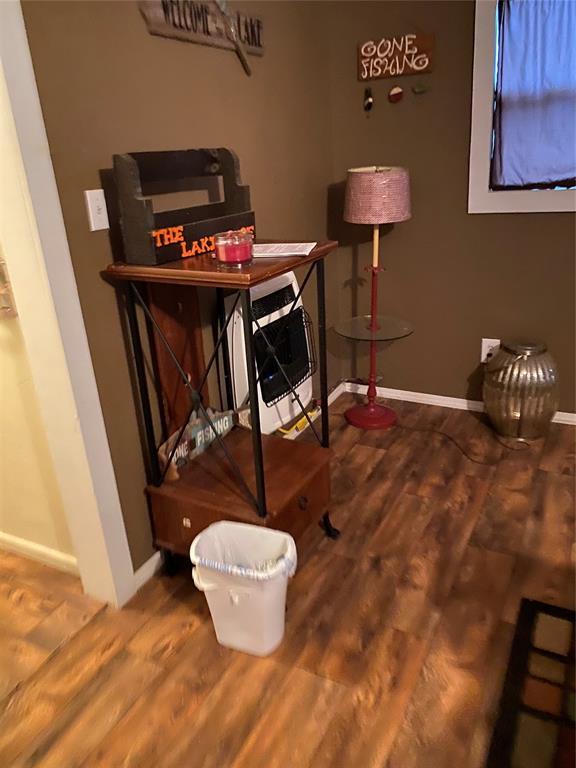 interior space with hardwood / wood-style flooring