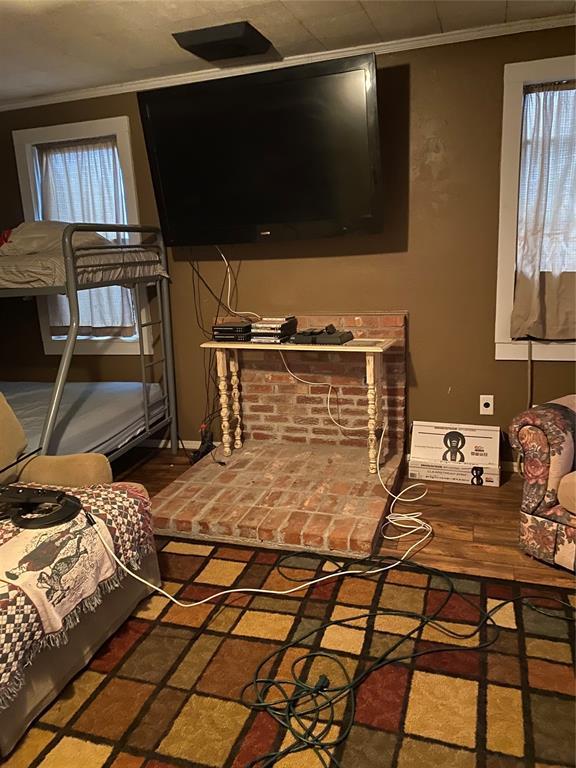 bedroom with ornamental molding