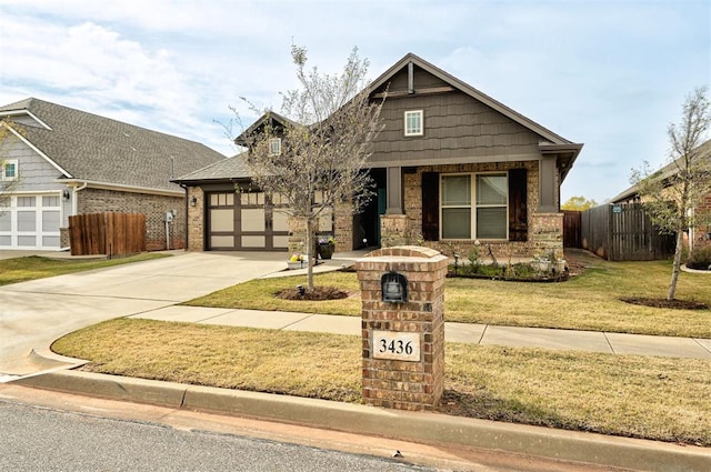 craftsman inspired home featuring a garage and a front yard