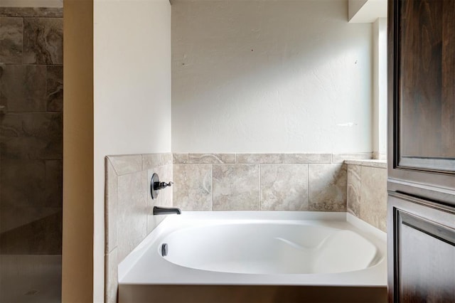 bathroom featuring a tub