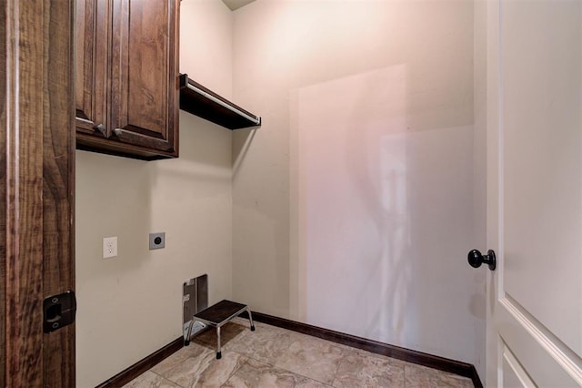 washroom with cabinets and electric dryer hookup