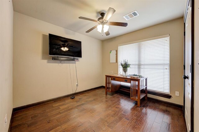 dining space with dark hardwood / wood-style floors and ceiling fan