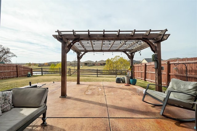 view of patio featuring a pergola