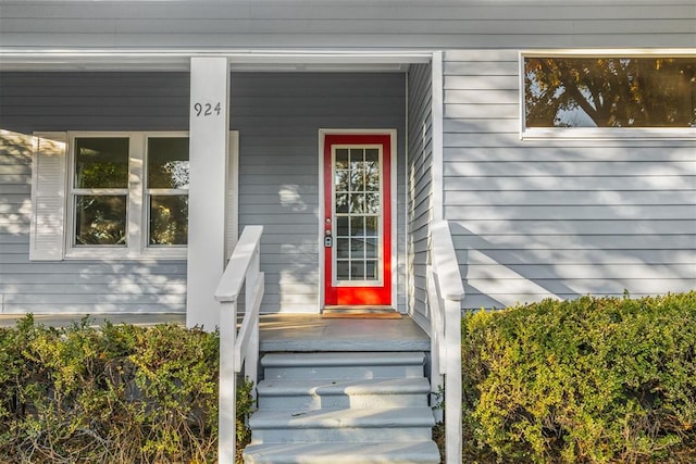 entrance to property with covered porch