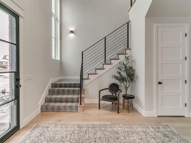 foyer entrance featuring light wood-type flooring