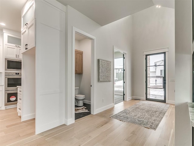 foyer entrance featuring light hardwood / wood-style floors