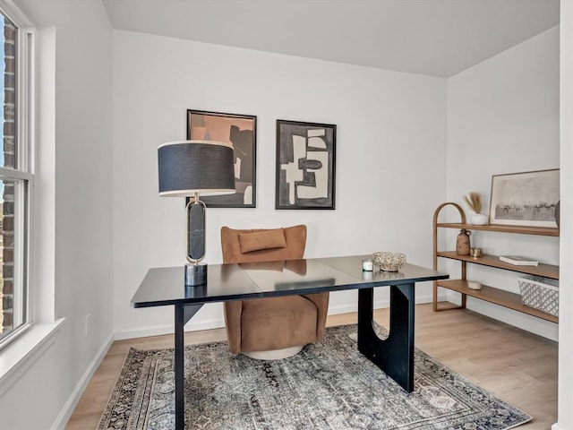 home office featuring hardwood / wood-style floors