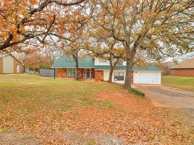 ranch-style home featuring a front yard