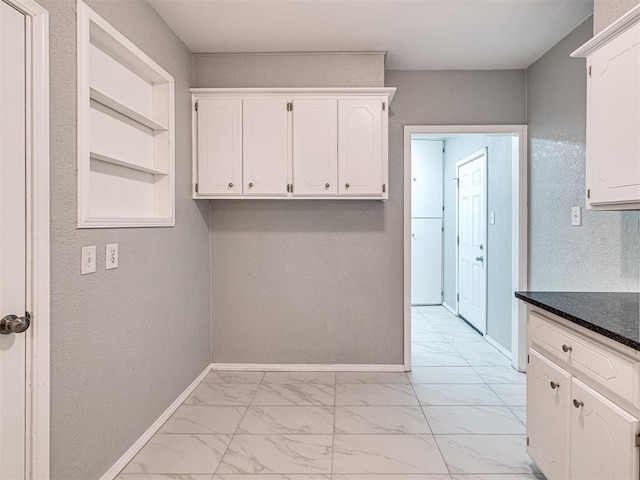 kitchen with white cabinets